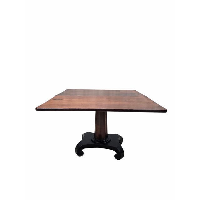 Antique American Empire Flame Mahogany Flip-Top Game Table A handsome antique American Empire game table crafted from...