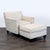 This Crate & Barrel lounge chair with matching ottoman is perfect for relaxing in style. It features a soft cream fabric...