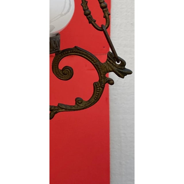 19th Century French antique white opaline glass chandelier. Beautiful details of the unusual chain links design holding...