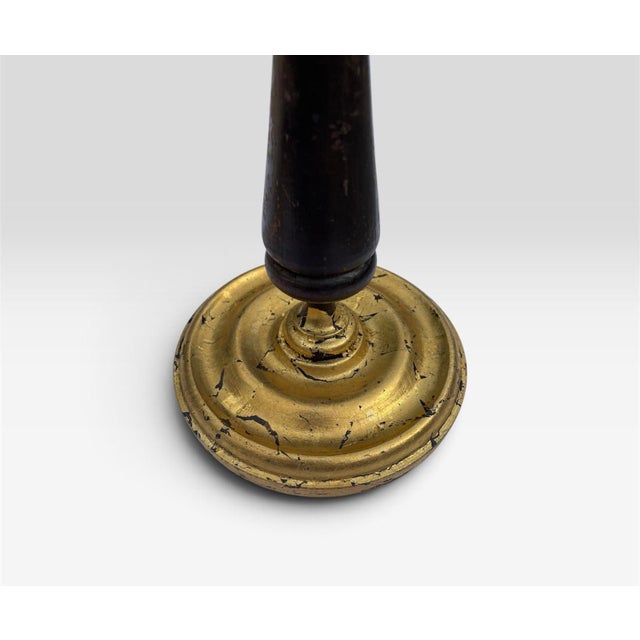 Vintage tall wood Empire style candleholders with gold leaf application. A unique statement piece.