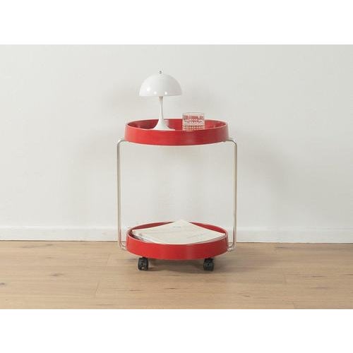 Space age serving trolley Very good workmanshipHigh-quality materialsMade in Germany Width: 44 cm Height: 52 cm Depth: 38...