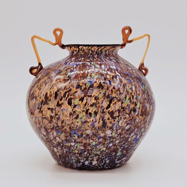 Offered for sale is an exquisite small amber vase covered by multi-color granzioi (small fragments of glass) with amber...