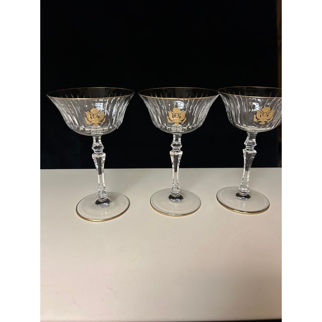 Set of (6) US State Dept Gold Seal Champagne/Tall Sherbet Glasses. Size: 6 1/4" h x 4" d. Each Rim and Base Is Trimmed in...