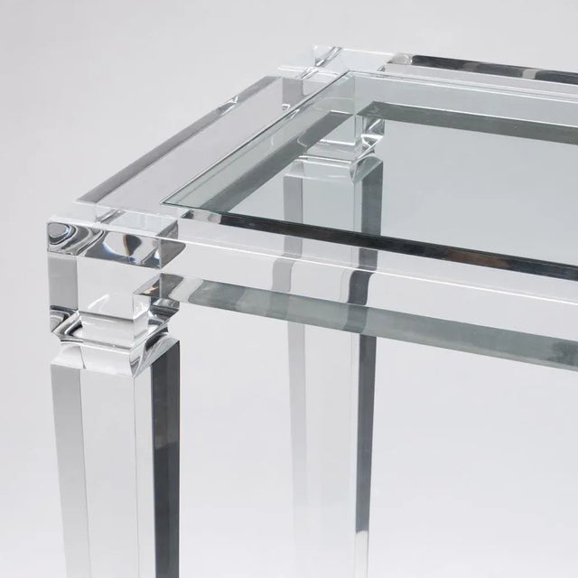 A pair of clear acrylic glass console table with glass top. Italian design