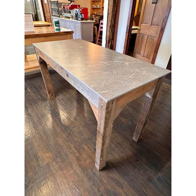 Sturdy construction and a wide work surface make this the perfect table for potting and gardening. Reclaimed wood creates...