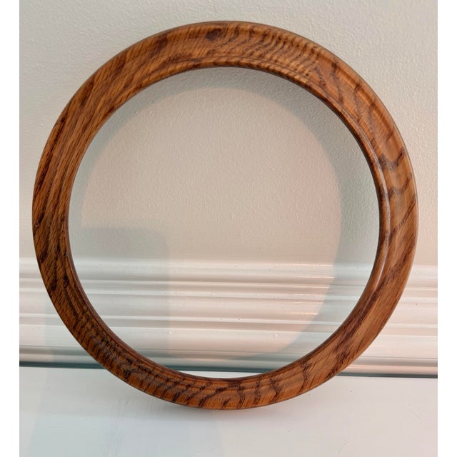 Charming vintage set of five solid oak wall plate frames by Van Hygan & Smythe. Each circular frame features beautifully...