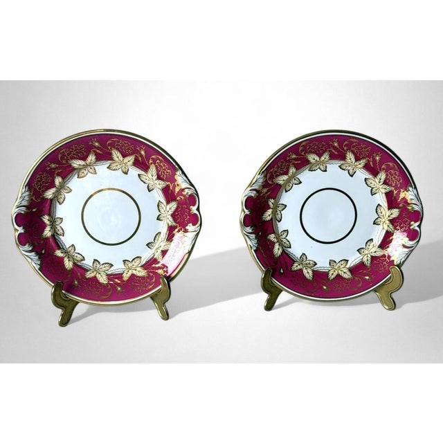 Elegant pair of French “Porcelaine de Paris” dessert trays, finely decorated with delicate floral motifs executed with...