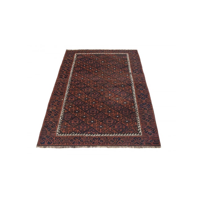 Handknotted vintage Afghan wool rug. Approximately 65-75 years old. In very good condition.