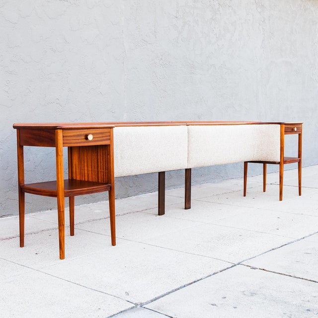 A newly restored South African mid century modern king-sized headboard with upholstered back panels and integrated...