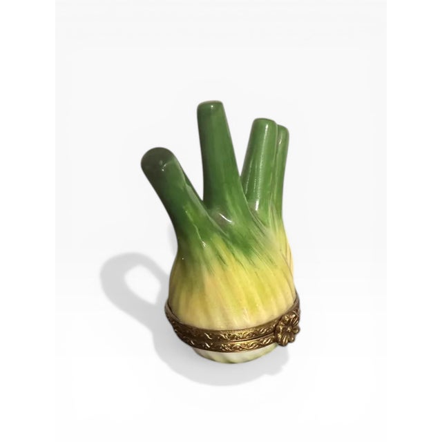 A finely detailed authentic Limoges porcelain trinket box, hand-painted (Peint Main) in the form of an anise or fennel...