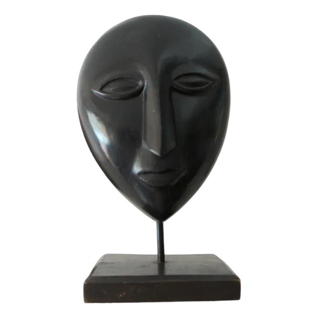 Ethnic Floating Head/Mask on Carved Wooden Pedestal For Sale