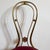 Vintage Italian brass chair attributed to Paolo Buffa, dating to the mid-20th century. The chair features a sculptural...
