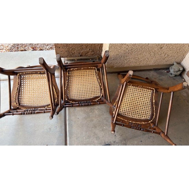 Great trio of French style ladder back chairs. With curved cane seats and tapered legs, they are an excellent addition to...