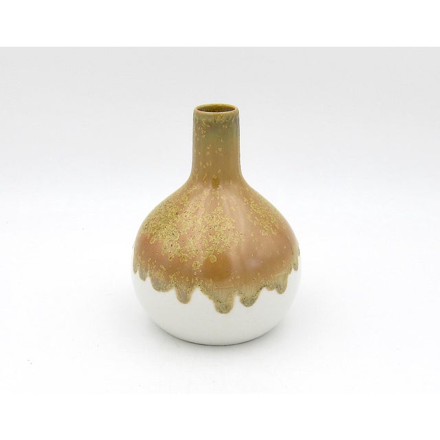 A vintage porcelain vase of globular form with a slender attenuated neck designed by Peter Müller for Sgrafo Modern of...