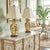 Offering a vibrant pair of vintage floral Chinese ceramic table lamps, circa Late 20th Century. These lamps are hand...