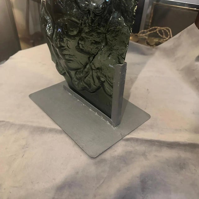 This is a striking and substantial 1980s abstract sculpture crafted from heavy, grey-toned Murano glass, attributed to the...