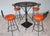 Burnt Orange Vintage Spanish Revival Wrought Iron Swivel Bar Stool Set With Matching Mesh Bar Table & Heavy Umbrella Stand – Mid-Century, Orange Vinyl For Sale - Image 8 of 12