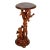 Wooden console with carved cupids frolicking on a tree. They form an original support for the tabletop, the edges of which...