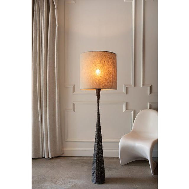 An authentic, striking Postmodern floor lamp from the 1980s by Tarogo. This piece features the designer's iconic, dramatic...