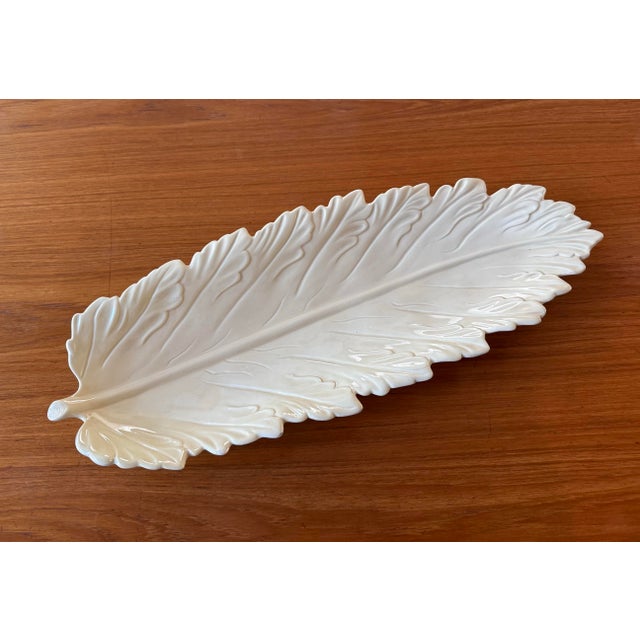 Large vintage cream-colored ceramic tray or platter in the shape of leaf. So many uses - everything from serving snacks to...