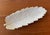 Large vintage cream-colored ceramic tray or platter in the shape of leaf. So many uses - everything from serving snacks to...