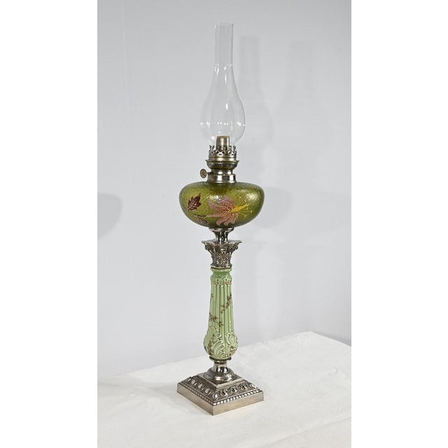 Magnificent Oil Lamp from the Art Nouveau period, original, in perfect working condition. This Lamp has a cracked opaline...
