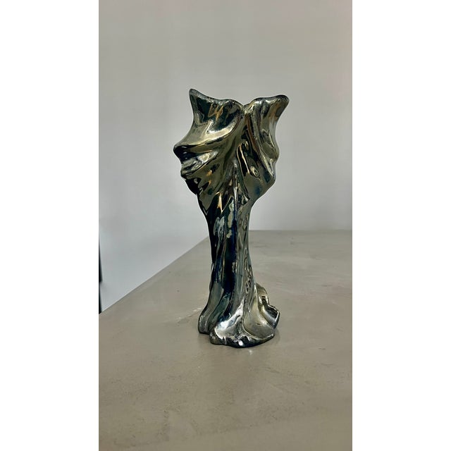 Vase or sculpture of a female figure in flamed stoneware with metallic oxides Signed at the base by the Rambervillers...