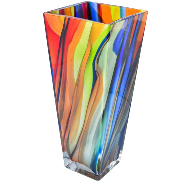 Gorgeous, rare and heavy, midcentury Polish vase hand-blown in a remarkable sleek sculptural form with ornate bright color...