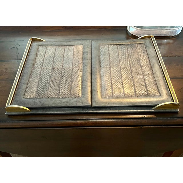 A sophisticated and classic blotter made in Mexico. The piece is trimmed in solid brass with a leather framework and...