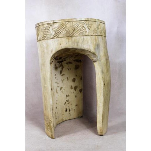 Introduce a touch of African elegance into your living space with this remarkable solid wood carved side table\.tool from...