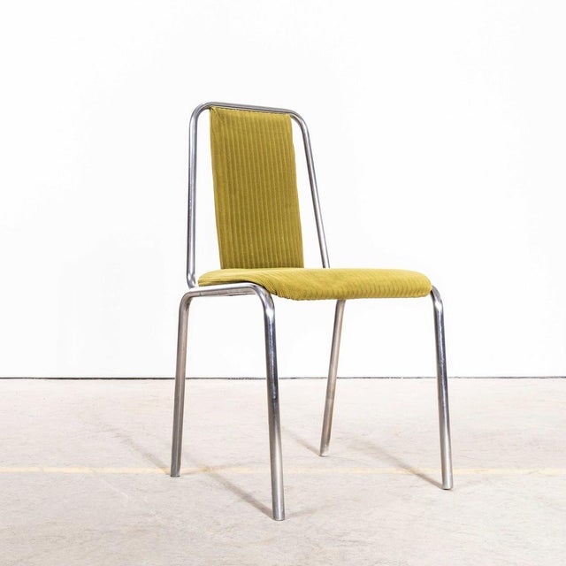 1980’s Olive Green Upholstered Chrome Framed Stacking Dining Chairs – Set Of Eight. Produced in the late eighties by...