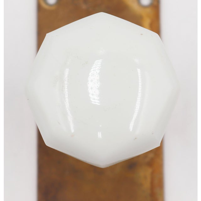 Vintage dummy door knob set made of a milk glass knob and a Yale & Towne brass back plate. The original mounting screws...