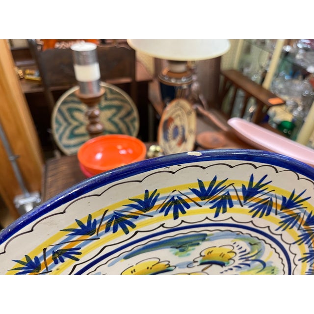 Here is a beautiful scenic charger from Sevilla Spain with all the farmhouse bells and whistles. I believe this was...