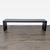 Employing the technique of parquetry, skilled woodworkers add artisan rusticity to the contemporary Dunewood dining bench....