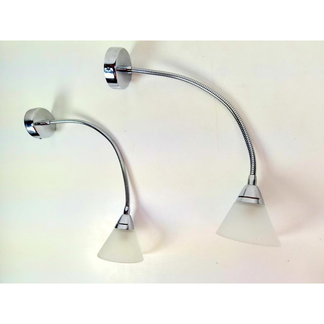 Pair of postmodern flexible gooseneck wall light from the Italian brand Alva-Line. It functions perfectly as an adjustable...