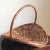 A gorgeous vintage flower gathering basket from Portugal. This mid-20th century basket features a rich and warm patina and...