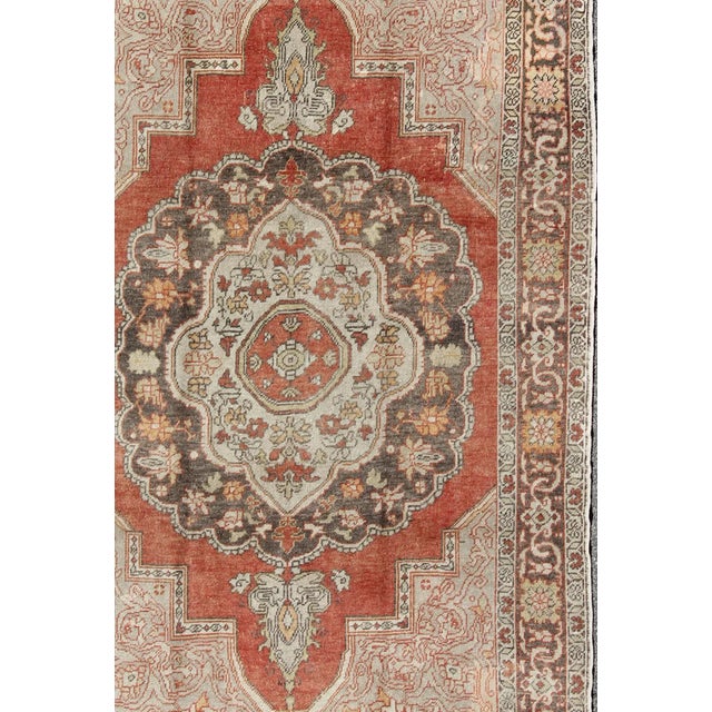 Antique Turkish Oushak Rug with Floral Medallion in Red, Charcoal and Cream Measures: 6'8 x 10'2. Antique Turkish Oushak...