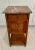 Here is a lovely, bedside cabinet or side table in the French Art Deco/Louis XVI style with a solid wood (I believe oak)...