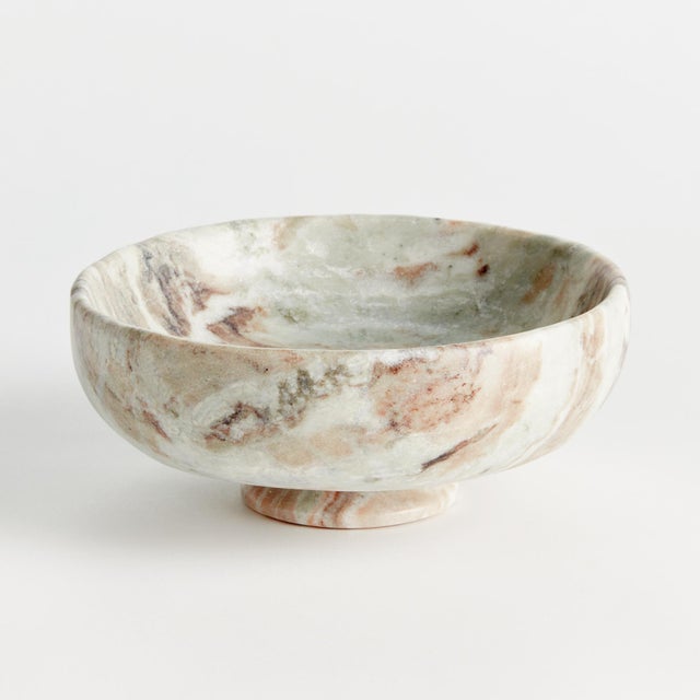 Honed to a semimatte finish, this stunning marble is specifically known for its unique darkBrown to lightBrown broad...