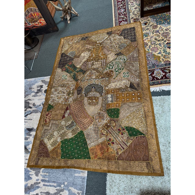 Design Plus Gallery presents an Indian Tapestry Artwork with Bead Embellishments. The fabric is an eatery brown tone with...