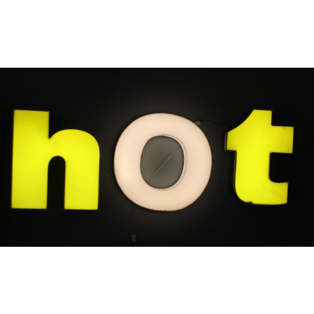 Vintage decorative illuminated letters made of yellow and white acrylic glass and metal. Fluorescent tubes replaced with...