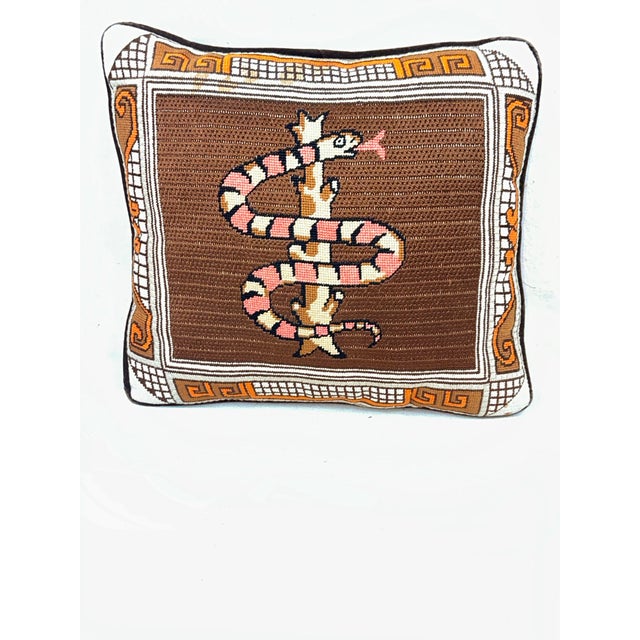 Add a touch of eclectic, storied charm to your space with this striking vintage handmade needlepoint throw pillow. Crafted...
