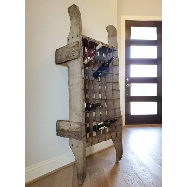 Rustic French country vineyard or winery two-person wooden wine bottle carrier. Hand-crafted in France in the late 19th...
