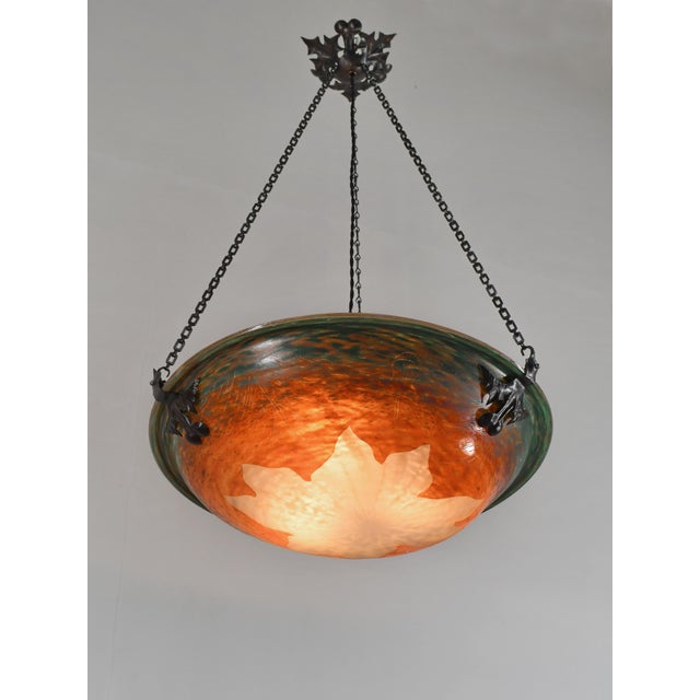 Charles Schneider - Le Verre Français A very large French art deco hanging fixture in wrought iron with a nice Schneider...