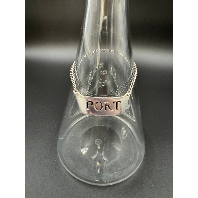 This sterling silver decanter label features the word "Port". It hangs from a delicate chain, making it easy to drape...