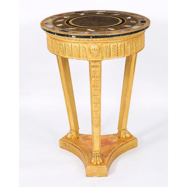 This is an elegant pair of Vintage Regency Revival giltwood occasional tables with specimen marble tops by the great...