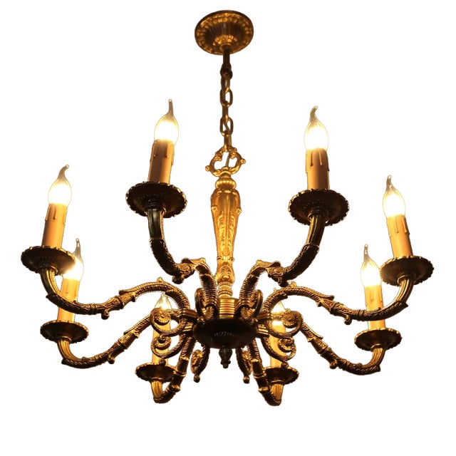 Eight-Arm Eclectic Chandelier in Cast Brass For Sale