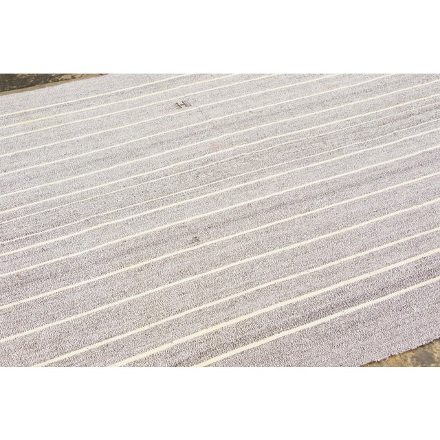 Handwoven in goat hair and originating circa 1950-1959, this 6x8 vintage Turkish kilim rug joins Rug & Kilim’s Kilim &...