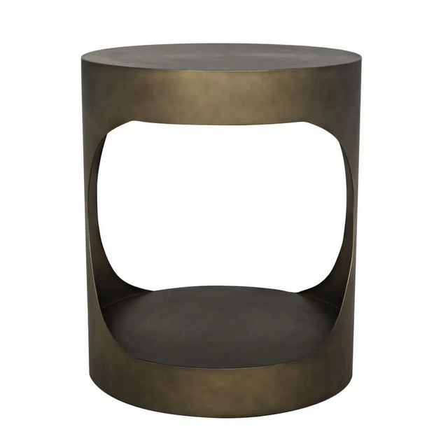 Quirky yet sophisticated, eclectic but familiar; this metal side table has just enough edge to elevate any modern decor.