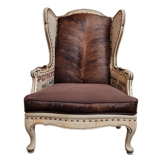 One-of-a-Kind Cowhide & Vintage Feed Sack Wingback Chair For Sale
